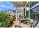 Inviting front porch with seating area, landscaping, and view of neighboring homes at 162 Kirkland St, Goose Creek, SC 29445