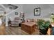 Living room with hardwood floors, comfortable seating, and a decorative chest at 162 Kirkland St, Goose Creek, SC 29445
