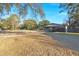Spacious backyard with covered parking and mature trees at 2002 Valnore Rd, Johns Island, SC 29455