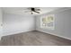 Simple bedroom with wood-look floors and a window at 2002 Valnore Rd, Johns Island, SC 29455