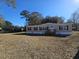Single wide mobile home with carport and large yard at 2002 Valnore Rd, Johns Island, SC 29455