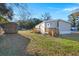 Tan mobile home with wooden deck and storage shed at 2002 Valnore Rd, Johns Island, SC 29455
