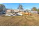Tan mobile home with wooden deck and spacious backyard at 2002 Valnore Rd, Johns Island, SC 29455
