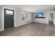 Bright living room featuring gray walls and wood-look floors at 2002 Valnore Rd, Johns Island, SC 29455