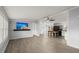 Open living and kitchen area with gray walls and wood-look floors at 2002 Valnore Rd, Johns Island, SC 29455
