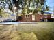 Brick house with deck, patio, and spacious backyard at 201 Center St, Walterboro, SC 29488
