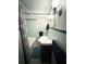Retro bathroom with teal tile and shower/tub combo at 201 Center St, Walterboro, SC 29488