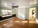 Bright living room with hardwood floors, fireplace, and large windows at 201 Center St, Walterboro, SC 29488