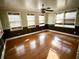 Spacious living room featuring hardwood floors and multiple windows at 201 Center St, Walterboro, SC 29488