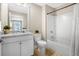 Clean bathroom with tub shower combo, granite countertop, and updated fixtures at 218 River Martin Ct, Summerville, SC 29483