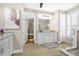 Elegant bathroom with walk-in shower, granite countertops, and large closet at 218 River Martin Ct, Summerville, SC 29483