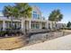 Community center with large porch and landscaping at 218 River Martin Ct, Summerville, SC 29483