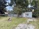 House with a grassy yard and trees at 2351 Elegans Dr, North Charleston, SC 29405