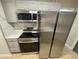 Stainless steel appliances in a galley kitchen at 2351 Elegans Dr, North Charleston, SC 29405