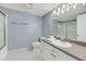Simple bathroom with white vanity, toilet, and shower at 2395 Folly Road Rd # 4F, Folly Beach, SC 29439