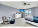 Bright bedroom with a king-size bed and access to balcony with water view at 2395 Folly Road Rd # 4F, Folly Beach, SC 29439