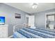 Bedroom with full-size bed and view of the ocean at 2395 Folly Road Rd # 4F, Folly Beach, SC 29439
