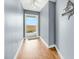 Bright hallway with access to balcony and water views at 2395 Folly Road Rd # 4F, Folly Beach, SC 29439