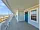 Building hallway with blue door and water views at 2395 Folly Road Rd # 4F, Folly Beach, SC 29439