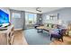 Living area featuring comfy seating and large windows at 2395 Folly Road Rd # 4F, Folly Beach, SC 29439