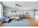 Living room with hardwood floors, comfy seating, and water views at 2395 Folly Road Rd # 4F, Folly Beach, SC 29439