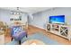 Living area featuring hardwood floors, seating, and a TV at 2395 Folly Road Rd # 4F, Folly Beach, SC 29439