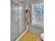 Clean bathroom with a shower/tub combo and window at 250 W Medina St, Summerville, SC 29483