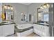 Double vanity bathroom with a large garden tub at 250 W Medina St, Summerville, SC 29483