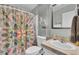 Small bathroom with shower, toilet and vanity at 250 W Medina St, Summerville, SC 29483