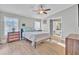 Bright bedroom with a ceiling fan and en-suite bathroom access at 250 W Medina St, Summerville, SC 29483