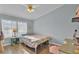 Cozy bedroom with a desk and lots of natural light at 250 W Medina St, Summerville, SC 29483