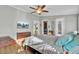 Well-lit bedroom with a ceiling fan and plenty of closet space at 250 W Medina St, Summerville, SC 29483