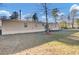 Tan mobile home with large windows and a spacious yard at 250 W Medina St, Summerville, SC 29483