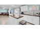 Kitchen features white cabinets, butcher block countertops and stainless steel appliances at 250 W Medina St, Summerville, SC 29483