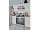 Kitchen features stainless steel appliances and white cabinets at 250 W Medina St, Summerville, SC 29483