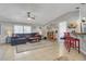 Spacious living room with gray sectional sofa and tile flooring at 250 W Medina St, Summerville, SC 29483