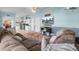 Spacious living room featuring comfortable seating and a view into the kitchen at 250 W Medina St, Summerville, SC 29483