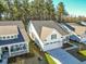 Aerial view of charming houses with tree-lined streets at 3204 Cross Vine Ln, Summerville, SC 29483