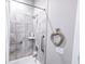 Shower with grab bar and tiled walls, accessible bathroom at 3204 Cross Vine Ln, Summerville, SC 29483