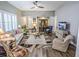 Bright living room with hardwood floors and comfortable furniture at 3204 Cross Vine Ln, Summerville, SC 29483