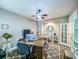 Bright home office features built-in shelving and hardwood floors at 3204 Cross Vine Ln, Summerville, SC 29483