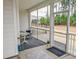 Relaxing screened porch with patio furniture and view of backyard at 3204 Cross Vine Ln, Summerville, SC 29483