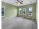 Bright bedroom with light green walls and carpet flooring at 376 Watergrass Way, Summerville, SC 29485