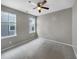 Simple bedroom with grey walls and carpet flooring at 376 Watergrass Way, Summerville, SC 29485