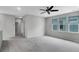 Large bedroom with grey walls, carpet, and ceiling fan at 376 Watergrass Way, Summerville, SC 29485