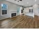 Open concept living and kitchen area with hardwood floors at 376 Watergrass Way, Summerville, SC 29485