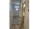 Bright entryway with luxury vinyl plank flooring and powder room at 493 Trotters Ln # 116, Moncks Corner, SC 29461