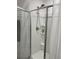 Clean shower with glass enclosure and gray shower curtain at 493 Trotters Ln # 116, Moncks Corner, SC 29461