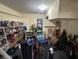 Unfinished basement with various storage items at 61 Twin Oaks Ln, Isle of Palms, SC 29451