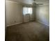 Bright bedroom with carpeted floor and window at 61 Twin Oaks Ln, Isle of Palms, SC 29451